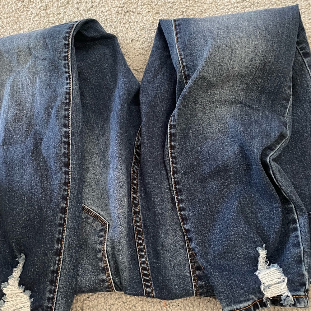 Womens Maternity jeans XL with rips at the bottom. Wore once